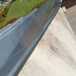 Pose de couvertines en zinc à coulisseaux
